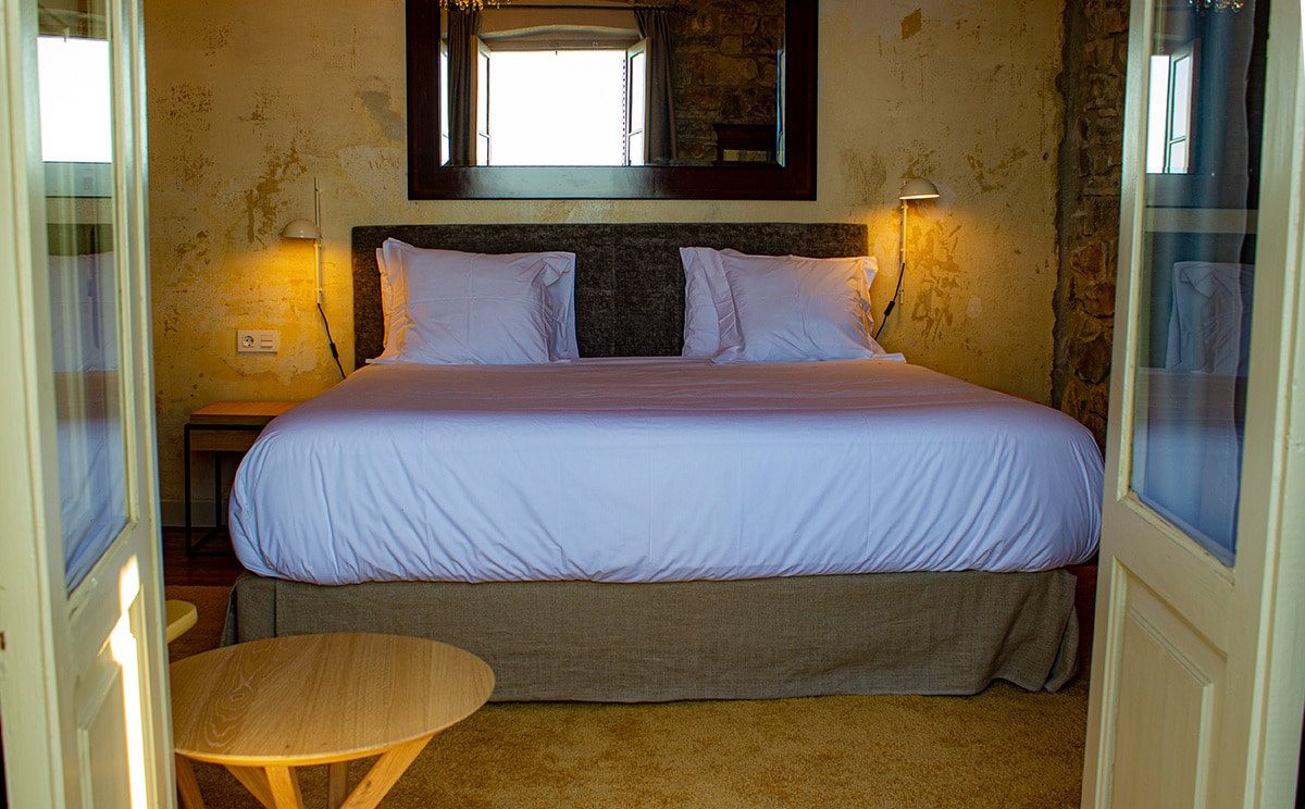 Bedroom 3 with stone wall