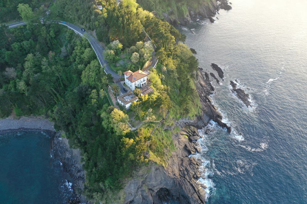 Villa Alkolea living room with stone walls and ocean light