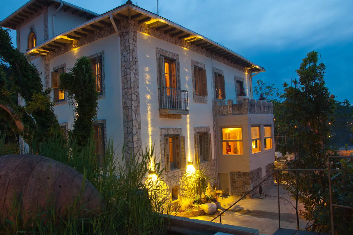Villa Alkolea exterior lit at night