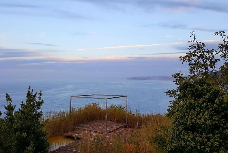 Cliffside deck and viewpoint at dusk overlooking the ocean