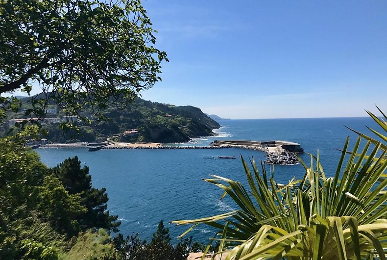 View of Mutriku harbour through the garden